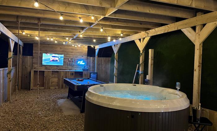 outside hot tub, and pool table